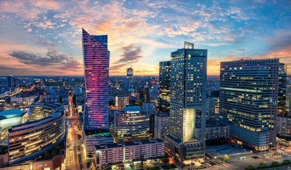 Warsaw,City,With,Modern,Skyscraper,At,Sunset