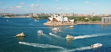 Sydney,Opera,House,With,Ferrys,In,Foregournd,,Taken,From,Harbor