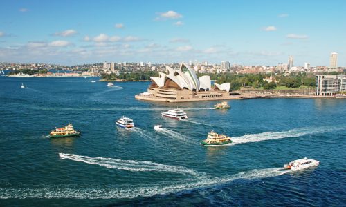 Sydney,Opera,House,With,Ferrys,In,Foregournd,,Taken,From,Harbor